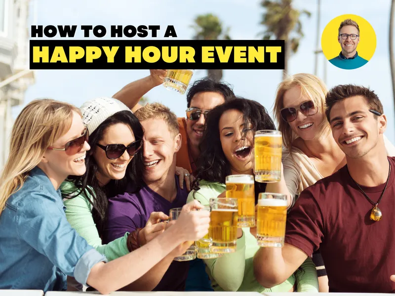 group of people holding up a beer in a beach