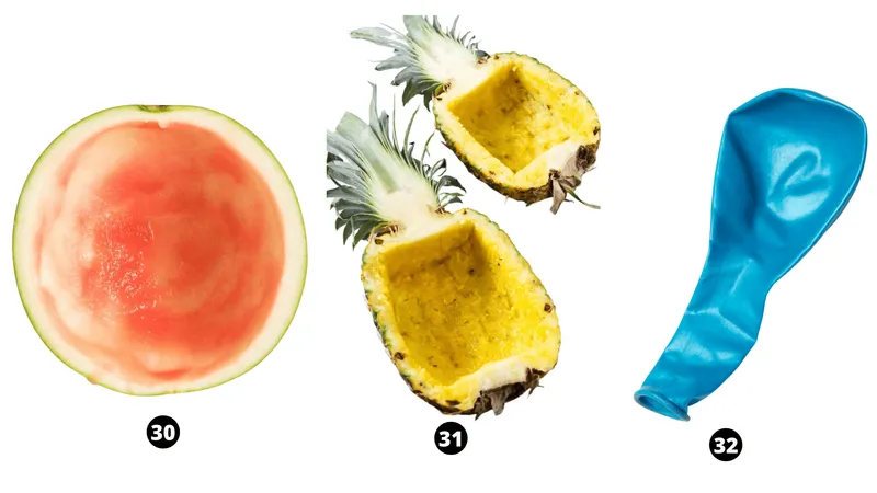 scooped out watermelon and pineapple and inflated balloon