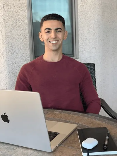 Lucas on his laptop