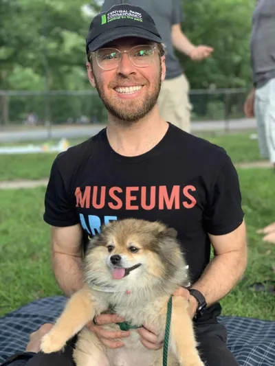nick gray with a puppy outdoors