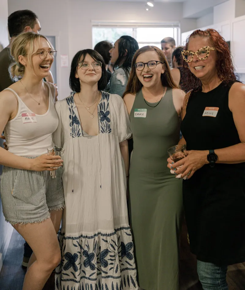 Tati's party guests having big laughs.