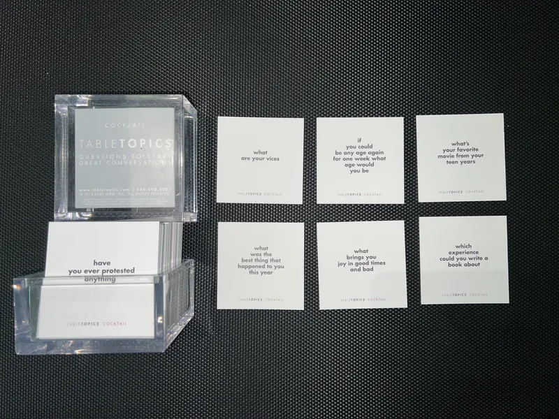 TableTopics Cocktail edition icebreaker card set with sample questions