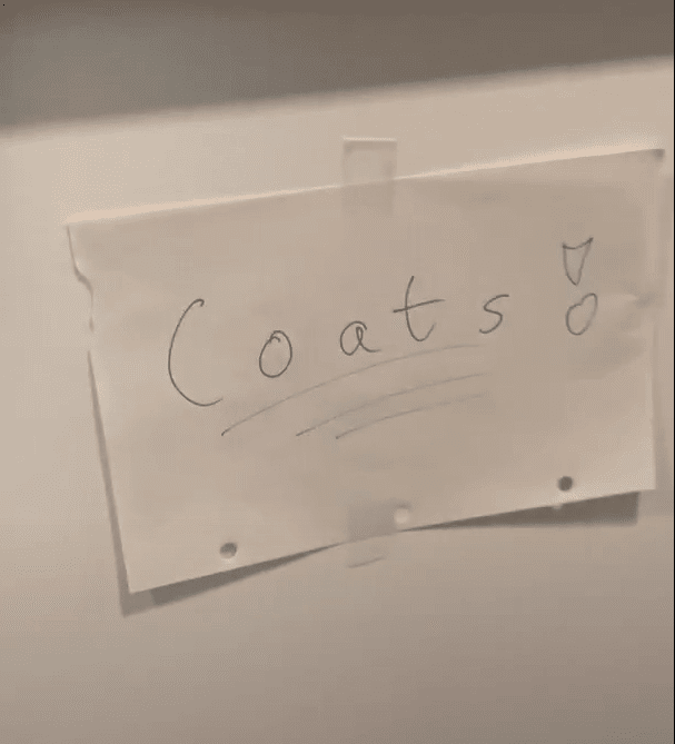 Party sign from Noah Adams' party saying "Coats!"