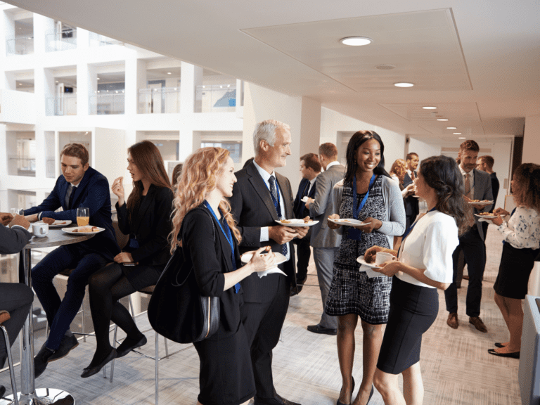 a group of people standing in a room